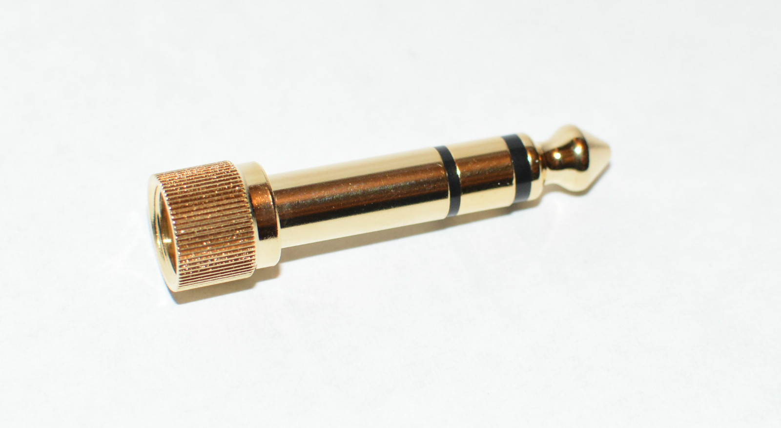 Locking 1/8" - 1/4" screw-on headphone adapter for Sony