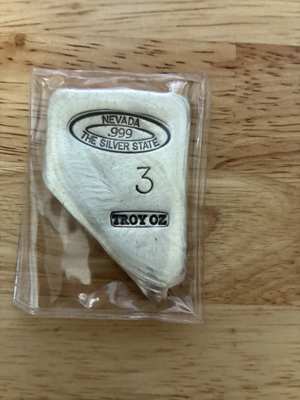 3 oz hand poured in the shape of Nevada.
