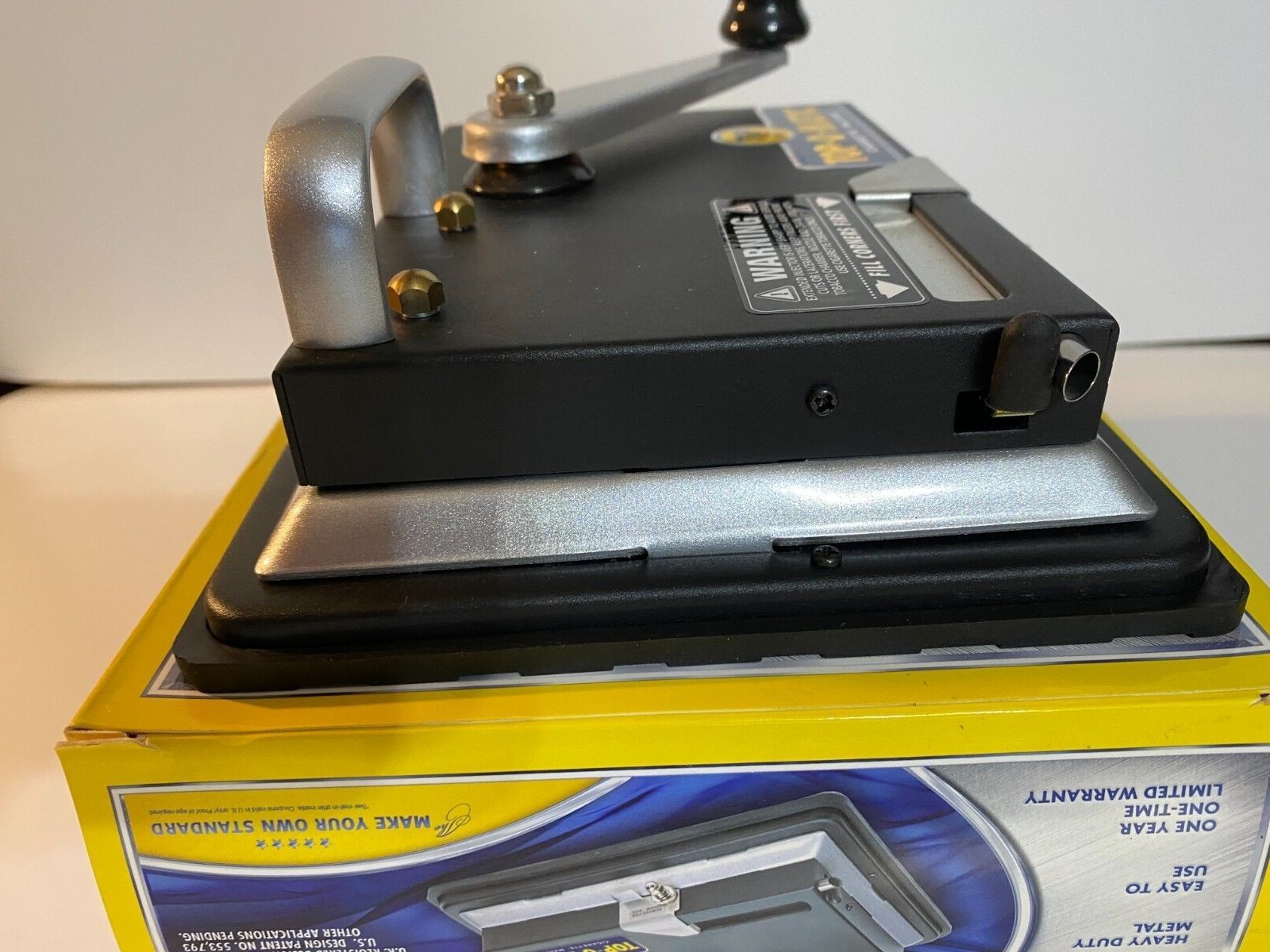 BRAND NEW, OPEN BOX, NEVER USED, TOP-O-MATIC CIGARETTE ROLLING MACHINE.