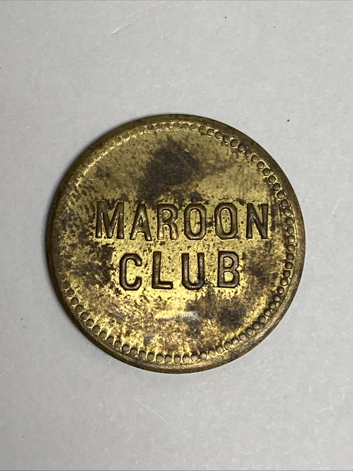 US Trade Token - MAROON CLUB - Good For 10 cent in Trade brass  spots