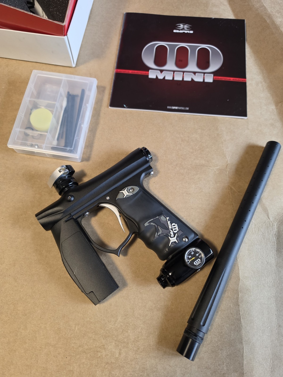 Used Empire Invert Mini paintball marker, barrel and tool kit In box