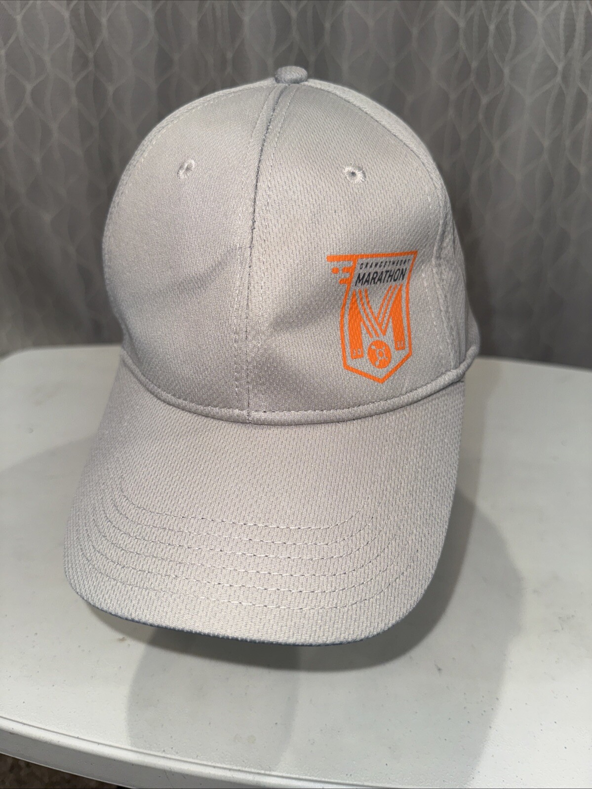 Orange theory Logo in orange on Gray Polyester Hat Cap Hook Loop EUC