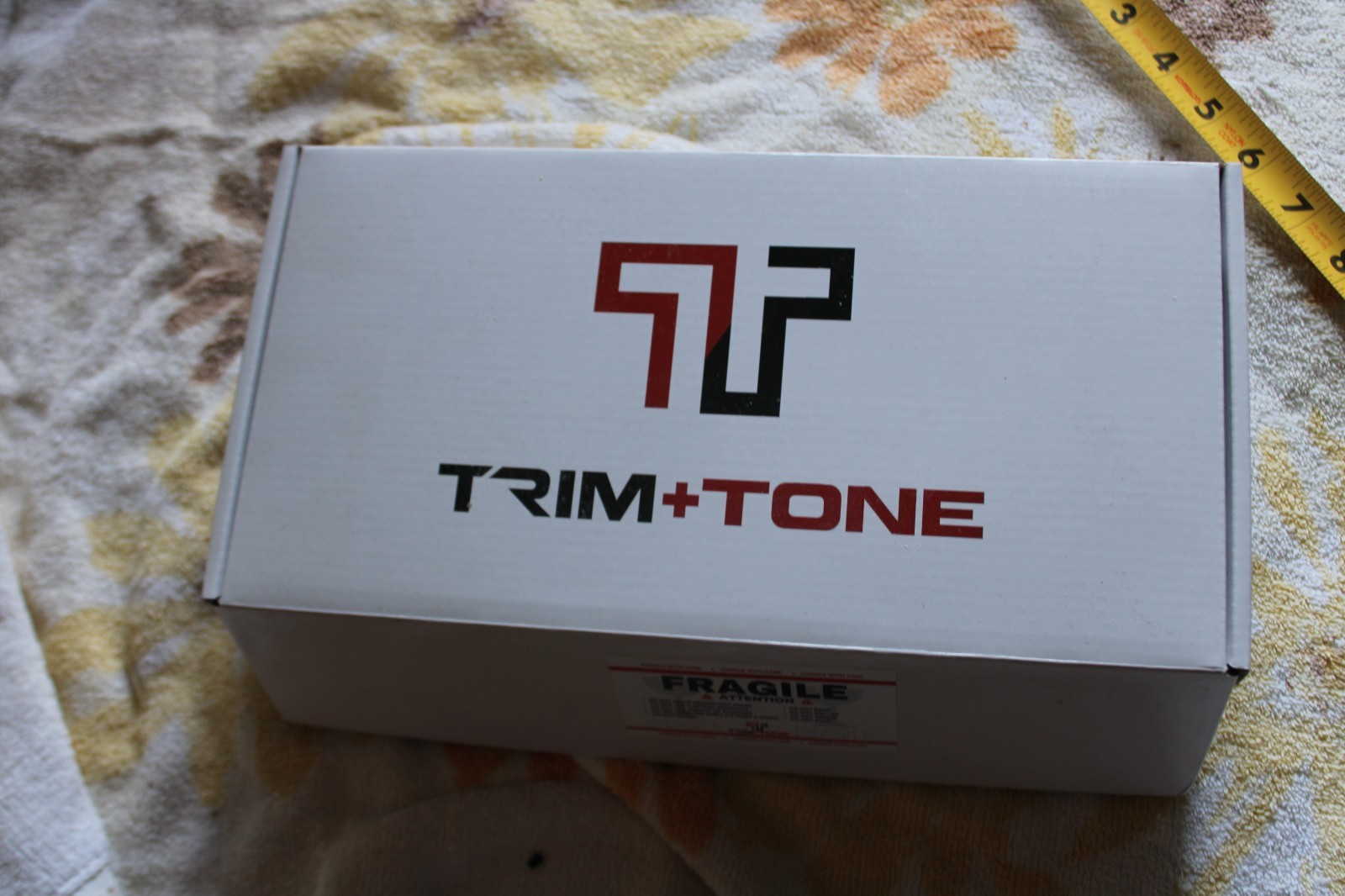 TRIM AND TONE BELT RED LIGHT THERAPY AND EMS ALL IN ONE UNIT FAT BURNING TONING