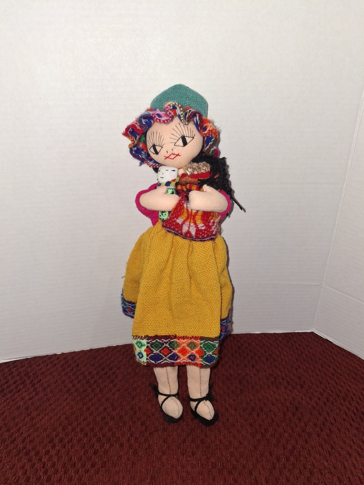 Peruvian Handmade Folk Doll In Traditional Clothing.