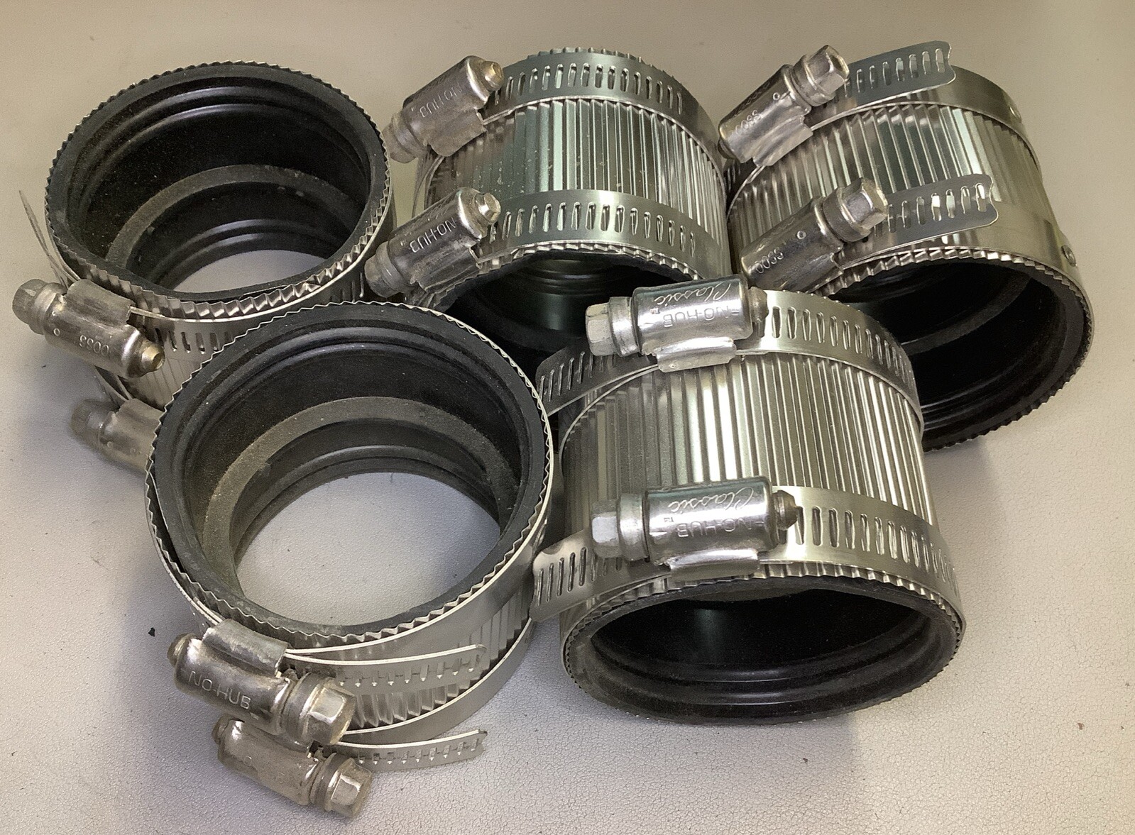 Lot of 5  No-Hub Rubber Couplers 300SS 2" NPT  (R46)