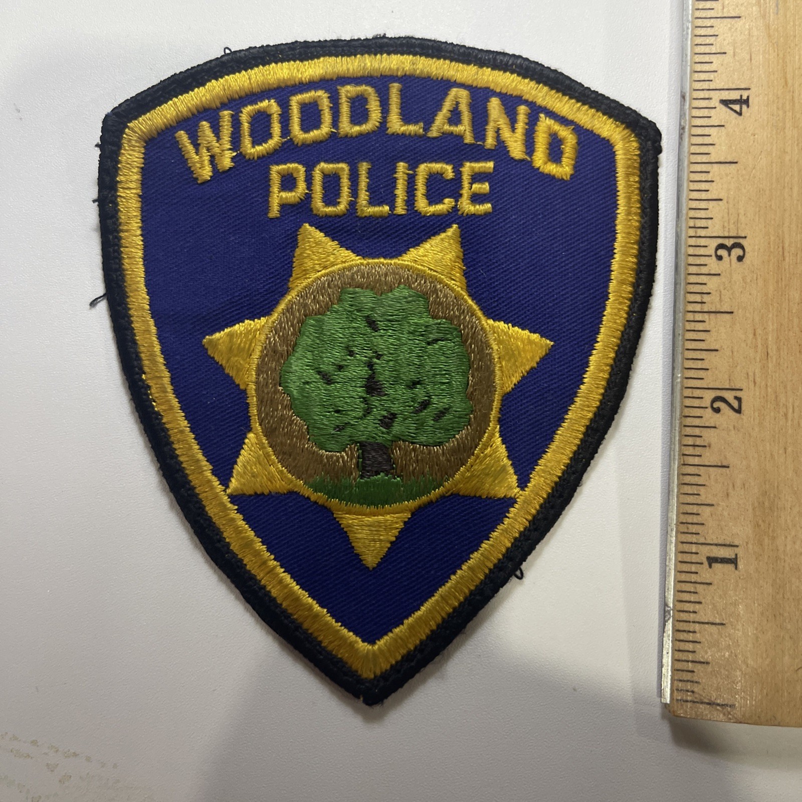 Woodland California Police Patch Purple Background With Gold Trim