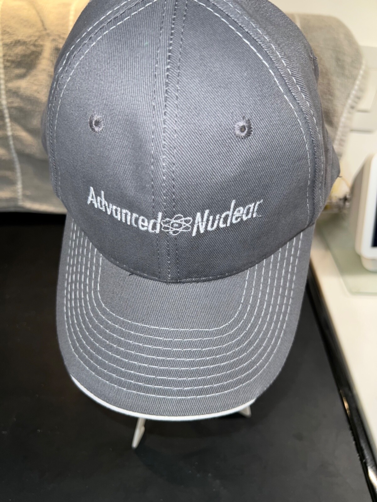 Advanced Nuclear Gray Hat Cap with white edge. Hat has topstitching is EUC Adj.