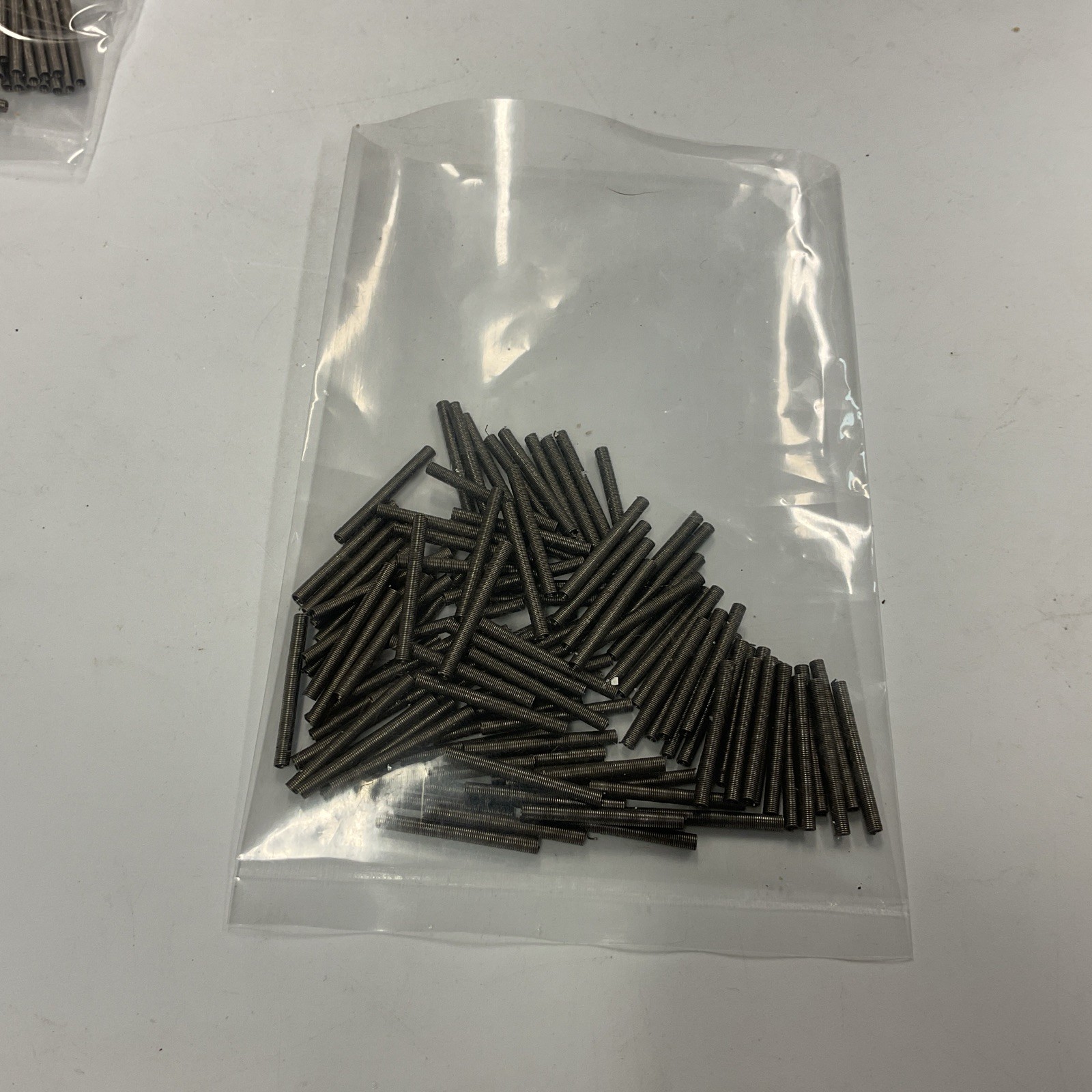 Worth Stainless Steel Coil Spring Fastener 100pk 1” Length .064 Dia Spinner Ext
