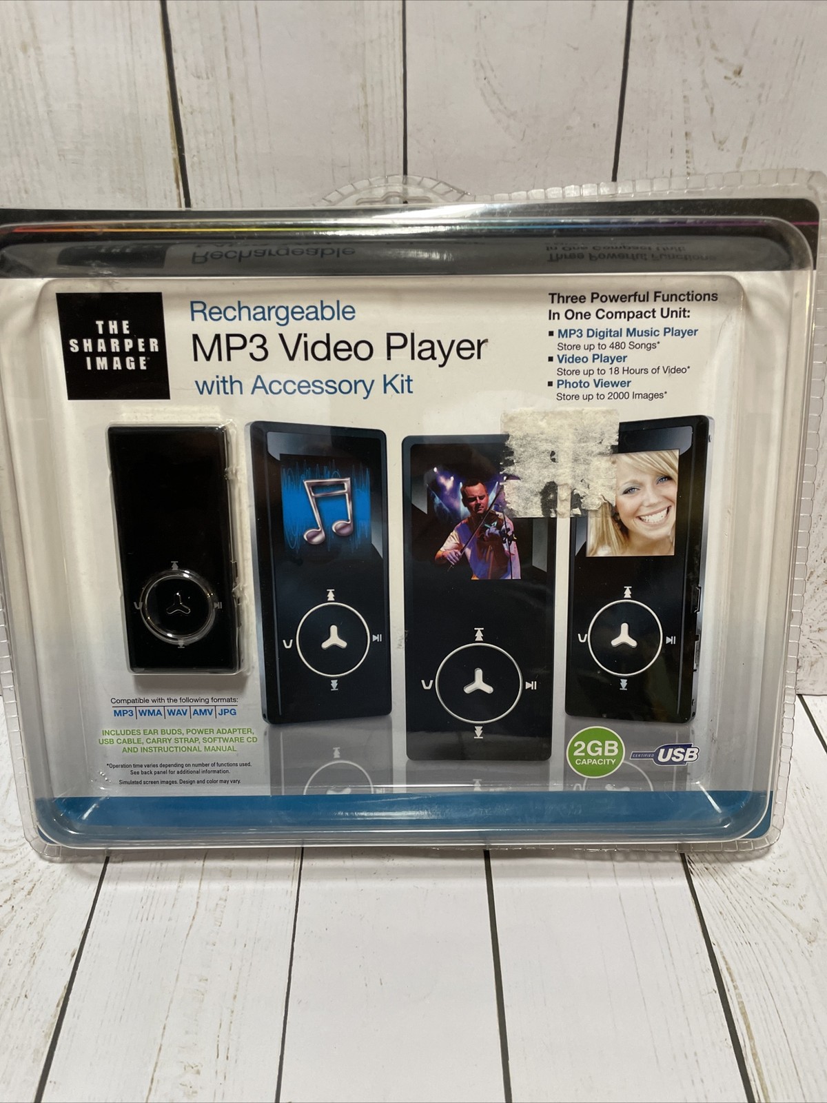The Sharper Image Rechargeable MP3 Video Player with Accessory Kit 2GB Brand New
