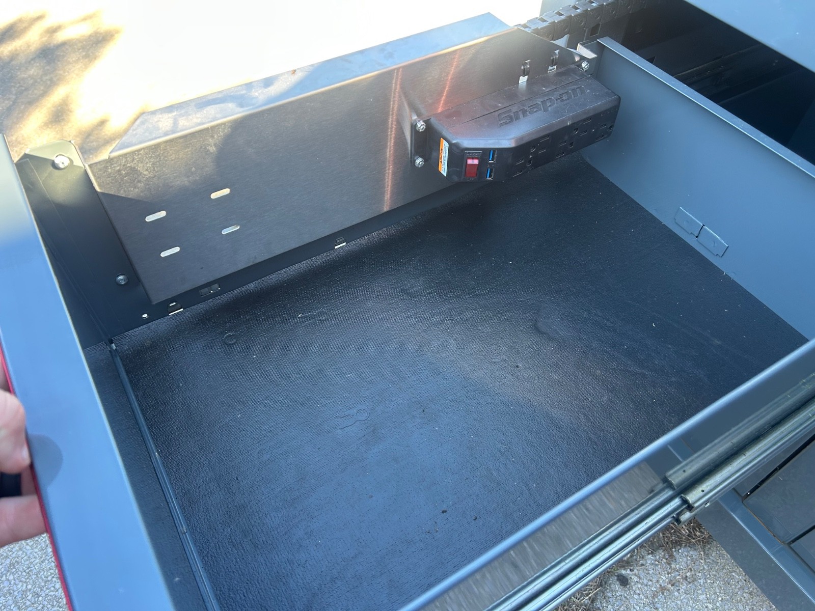 snap on tool box 55” has a small dent on the side It has a workbench power drawe