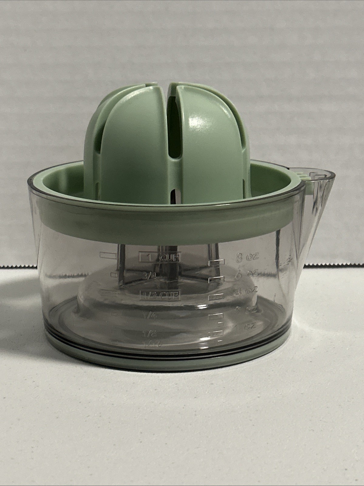 Manual Citrus Juicer Large Or Small Fruit With Labeled Measurements And Spout