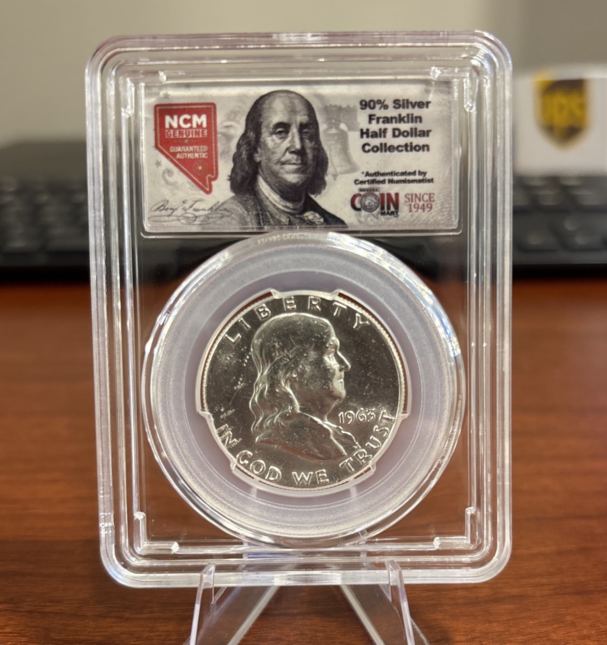 1963 50C Franklin Half Dollar Graded By NCM 90% Silver Top Chipped