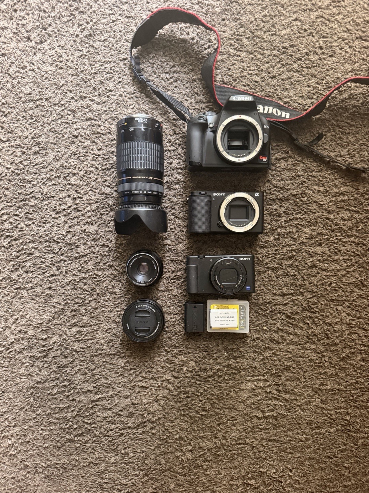 camera lot of 3. sony zv-e10, sony zv1, canon eos xs. additional e mount lenses.