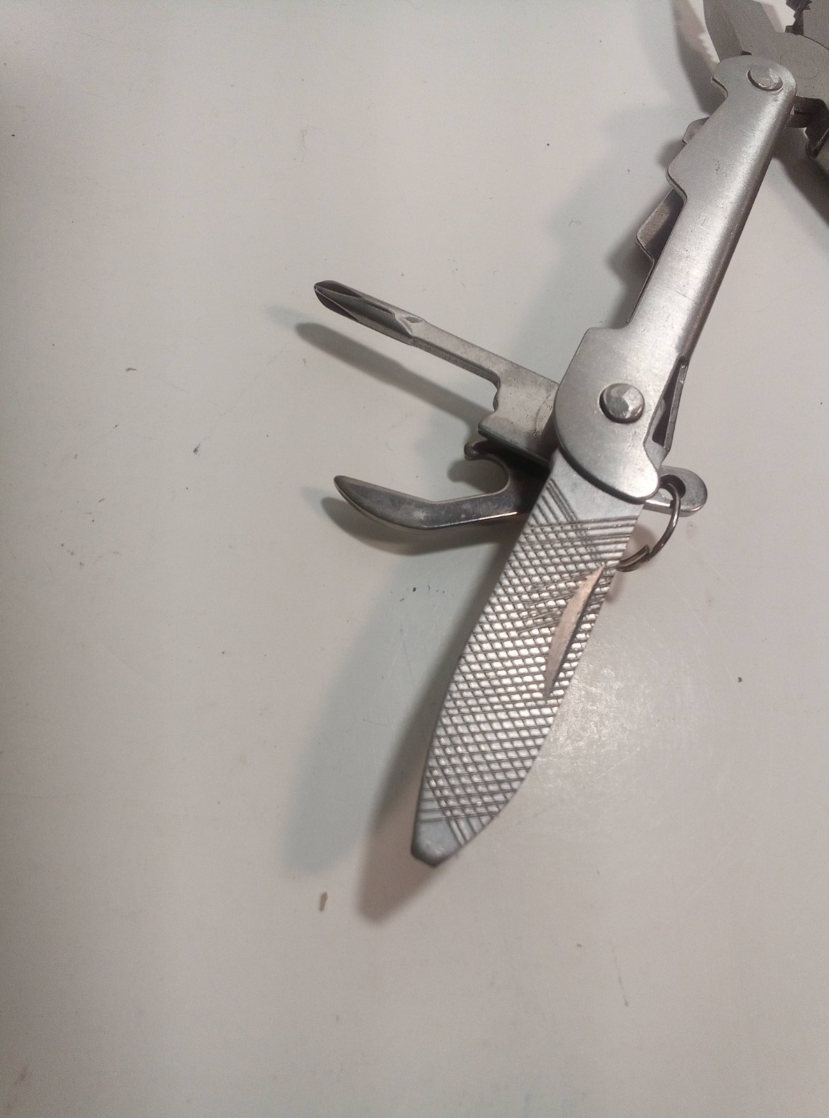 Silver Metal Multi-Tool with Pliers and Fold-Out Tools (U-10)