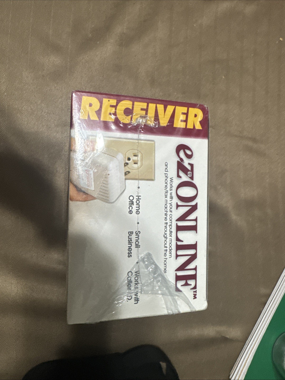 Ezonline Receiver Jack Turns electrical outlet into Computer/ Phone/ Fax ect..