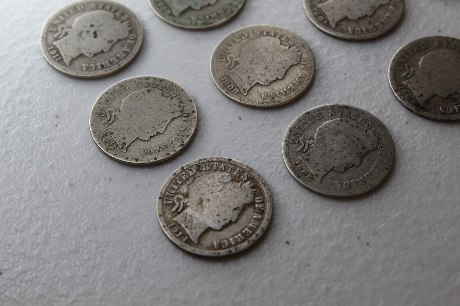 12 Very Old Very Worn Barber Dimes with dates