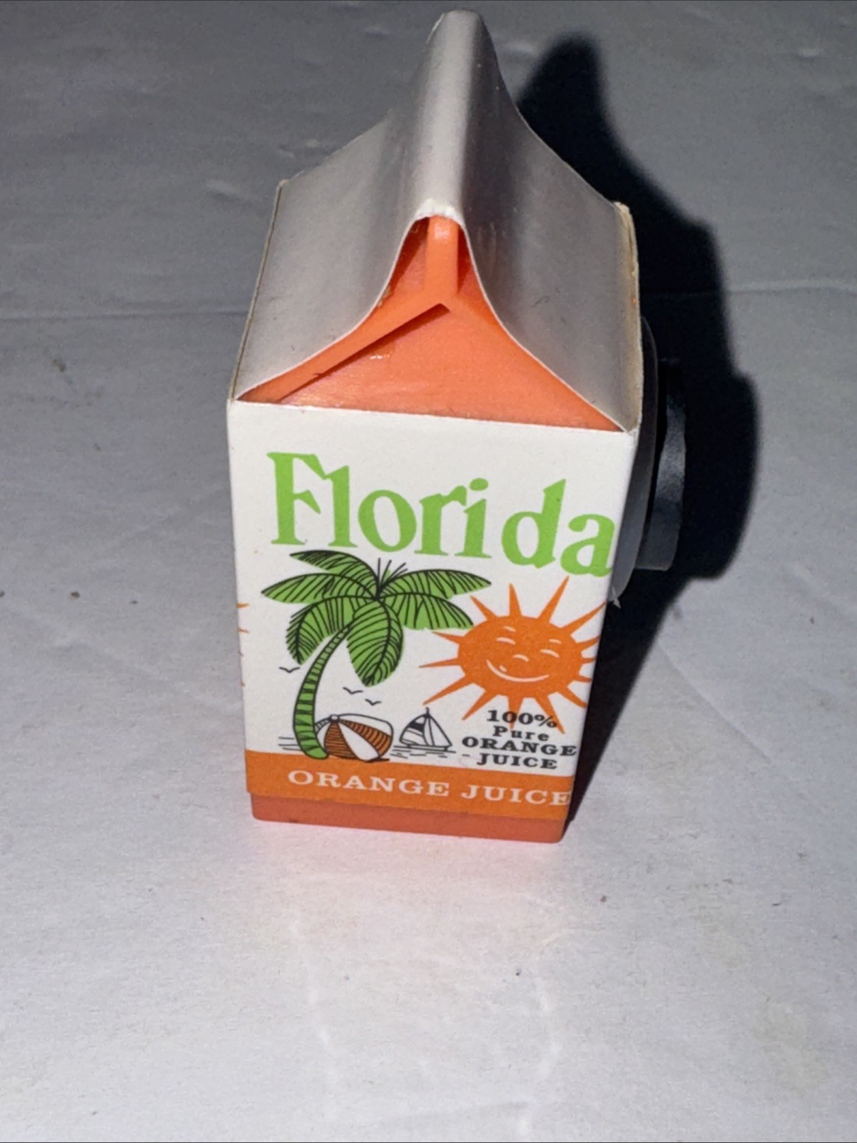 Vintage 1980’s Florida Orange Juice Carton Pencil Sharpener/magnet. Used
