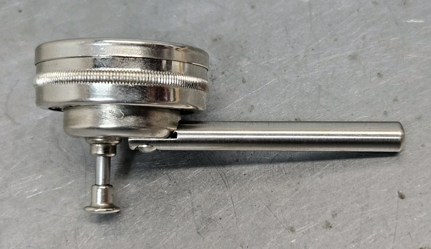 Starrett No. 196 dial indicator with a ??? magnetic base
