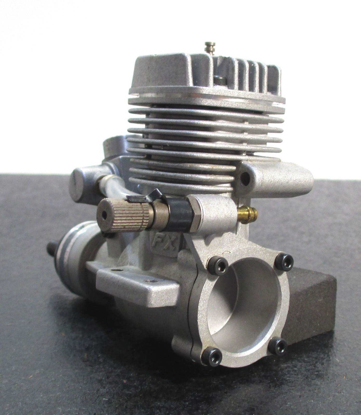 O.S. MAX-25FX 4.07cc 2-Stroke Glow Engine Includes muffler; used for RC airplane