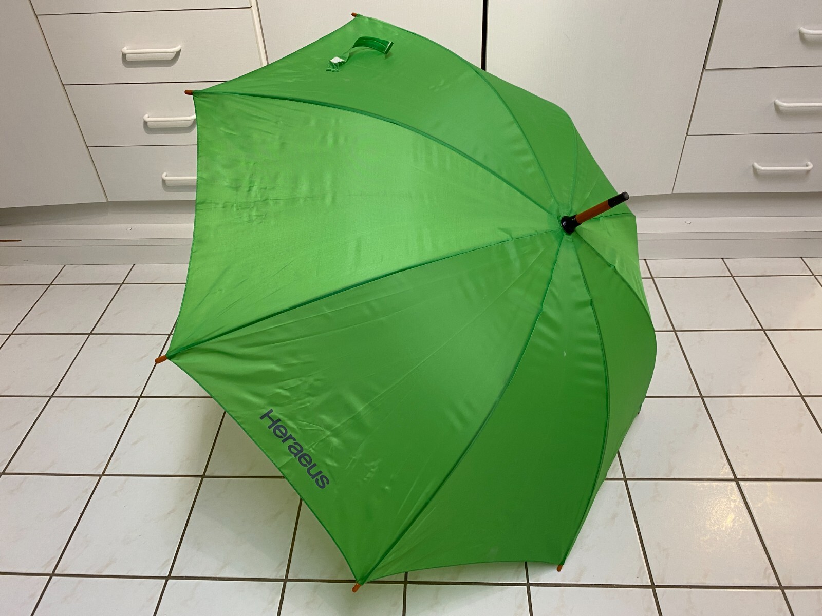 Umbrella, green with advertising print