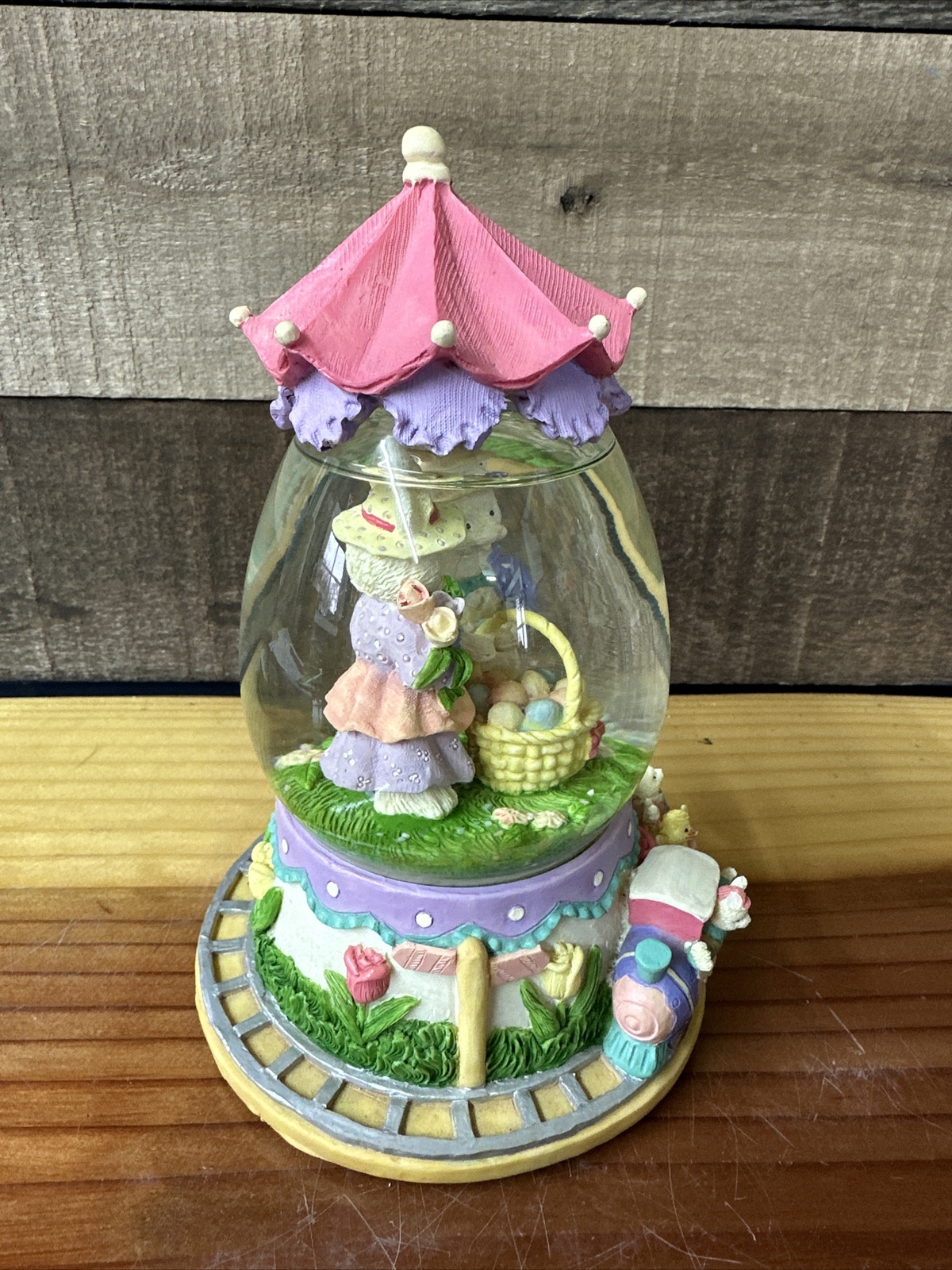 Easter musical snowglobe easter bonnet bunnies