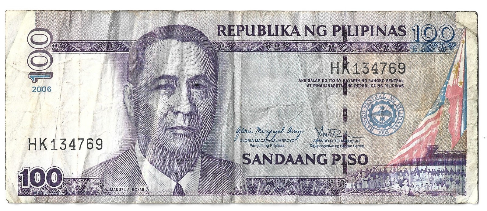PHILIPPINES 100 PESO MANUEL ROXAS 2006 CIRCULATED BANK NOTE
