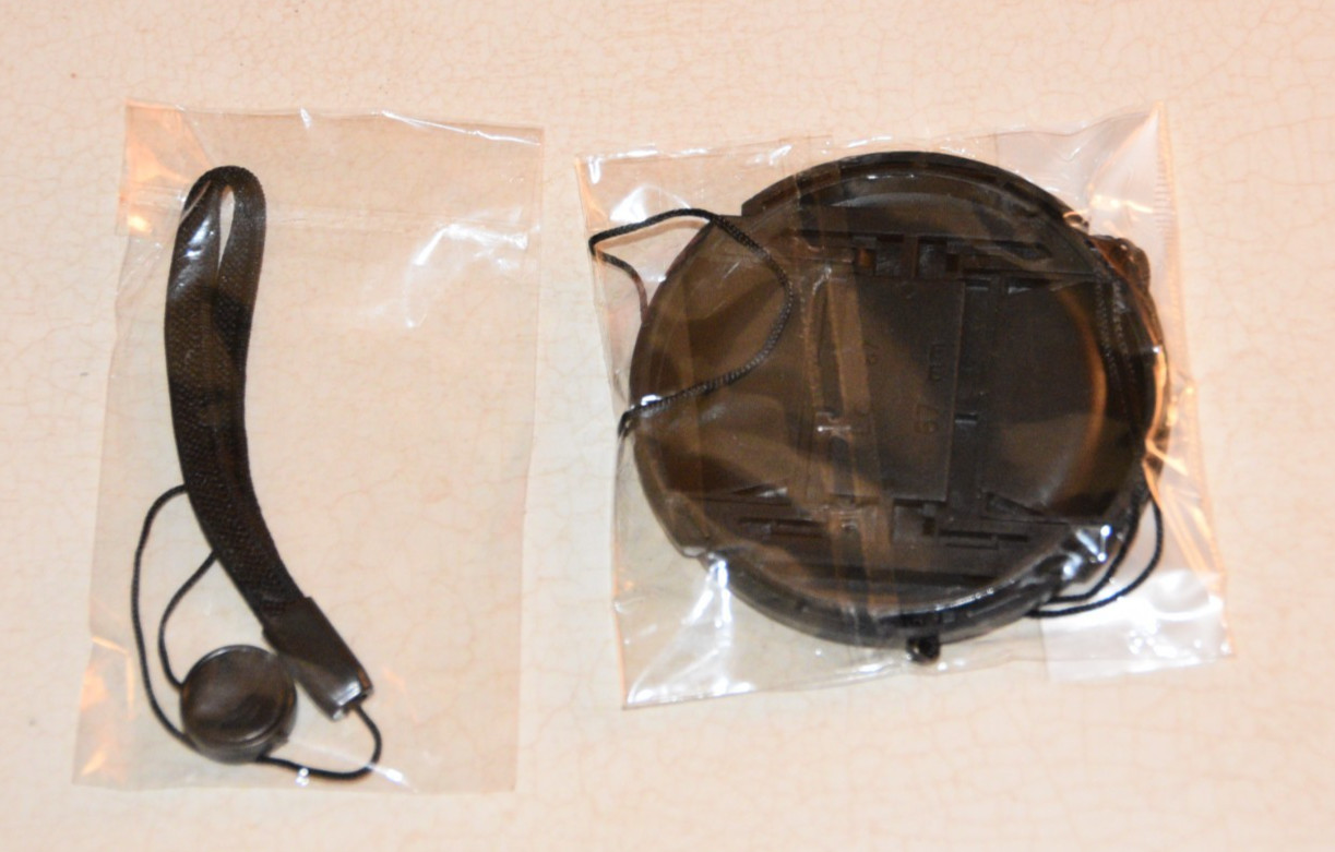 67mm Pinch Style Front Lens Cap with Strings - new in packages