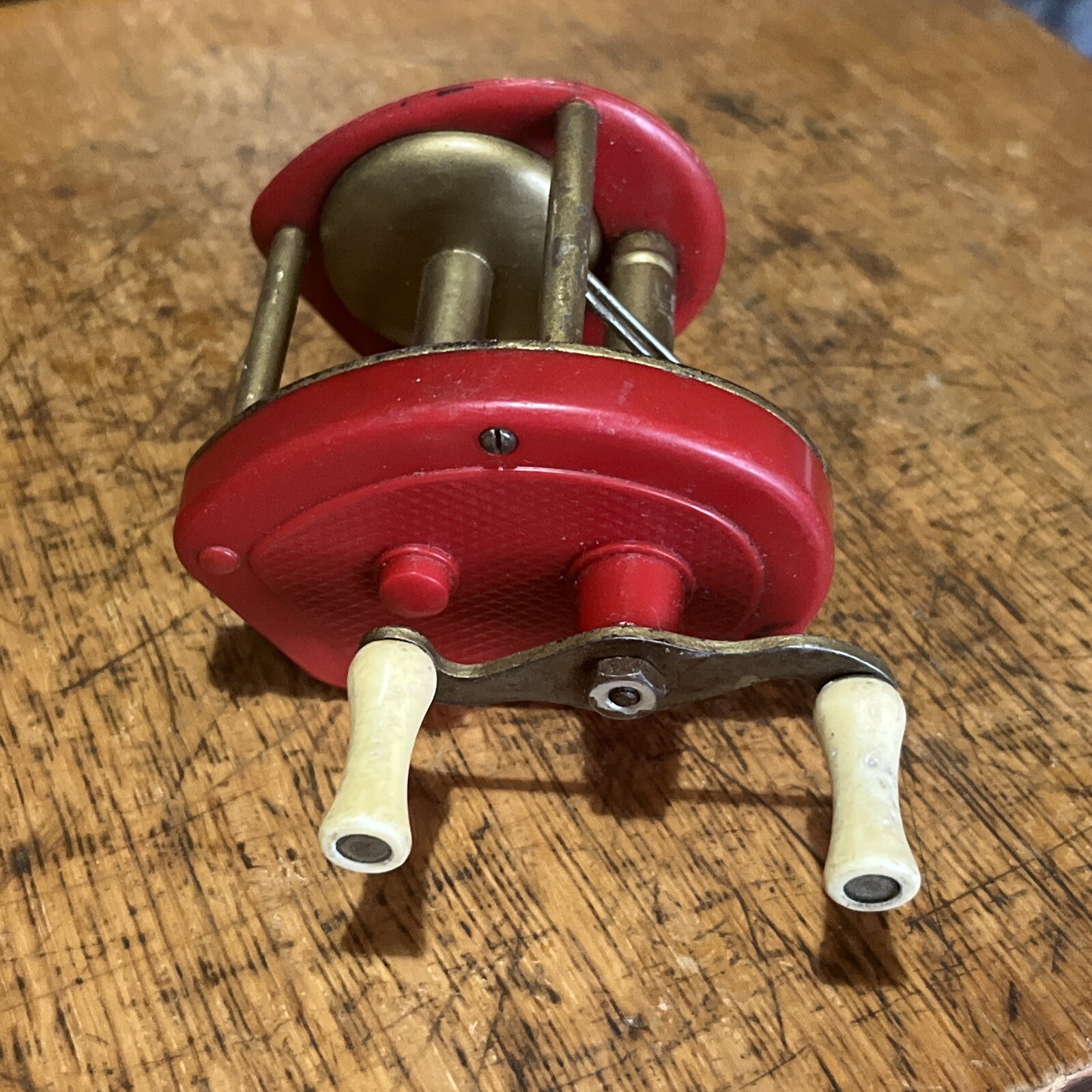 Made In USA Vintage Fishing Reel Red Plastic Bakelite Brass Color