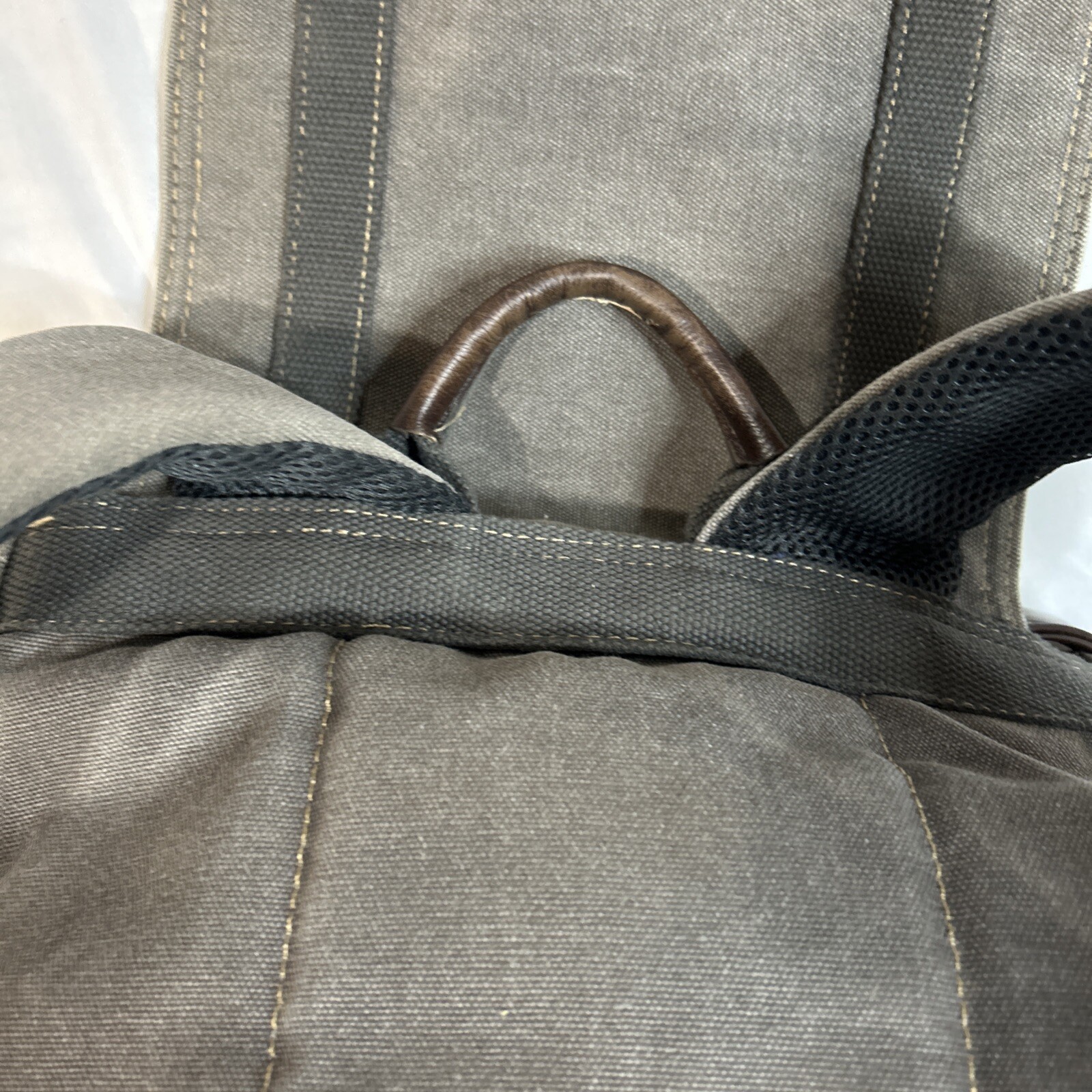 Cargoit Gray Canvas Backpack Magnetic Closures Pockets Straps and A Deep Inside