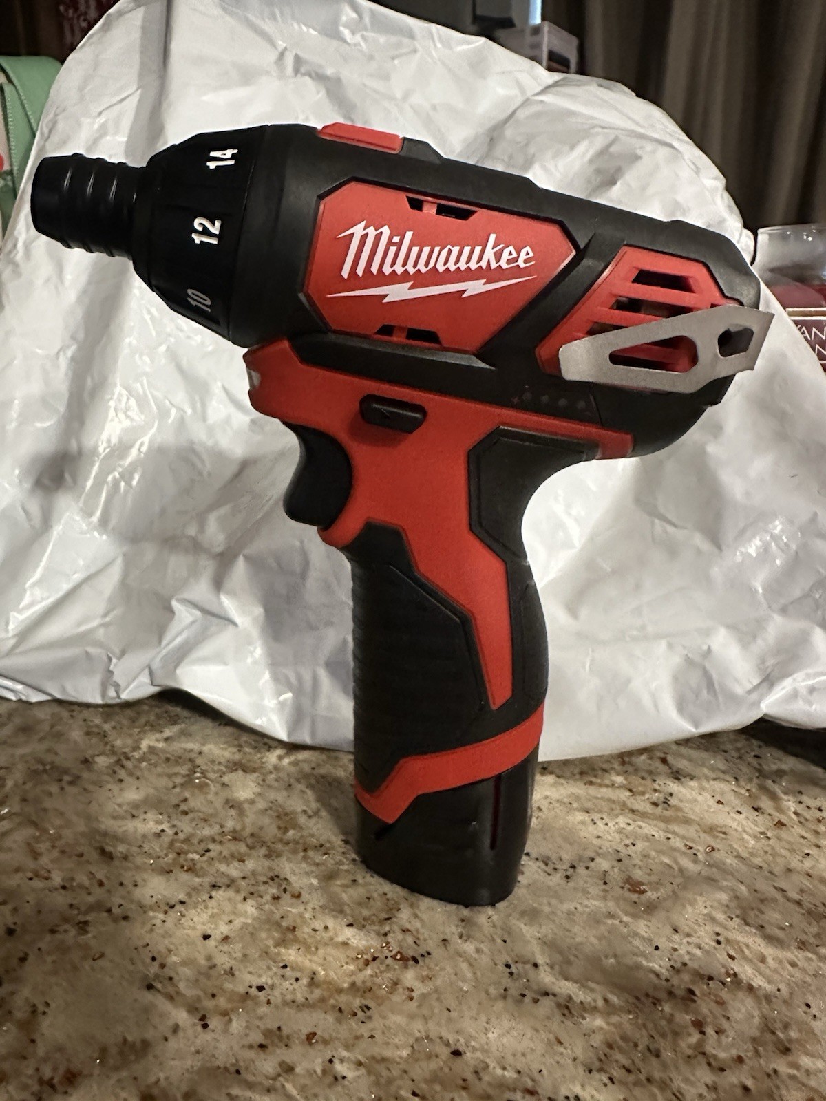 New W/O Box Milwaukee 1/4 inch M12 Screw Driver. 2.0ah  BatteryIncluded.