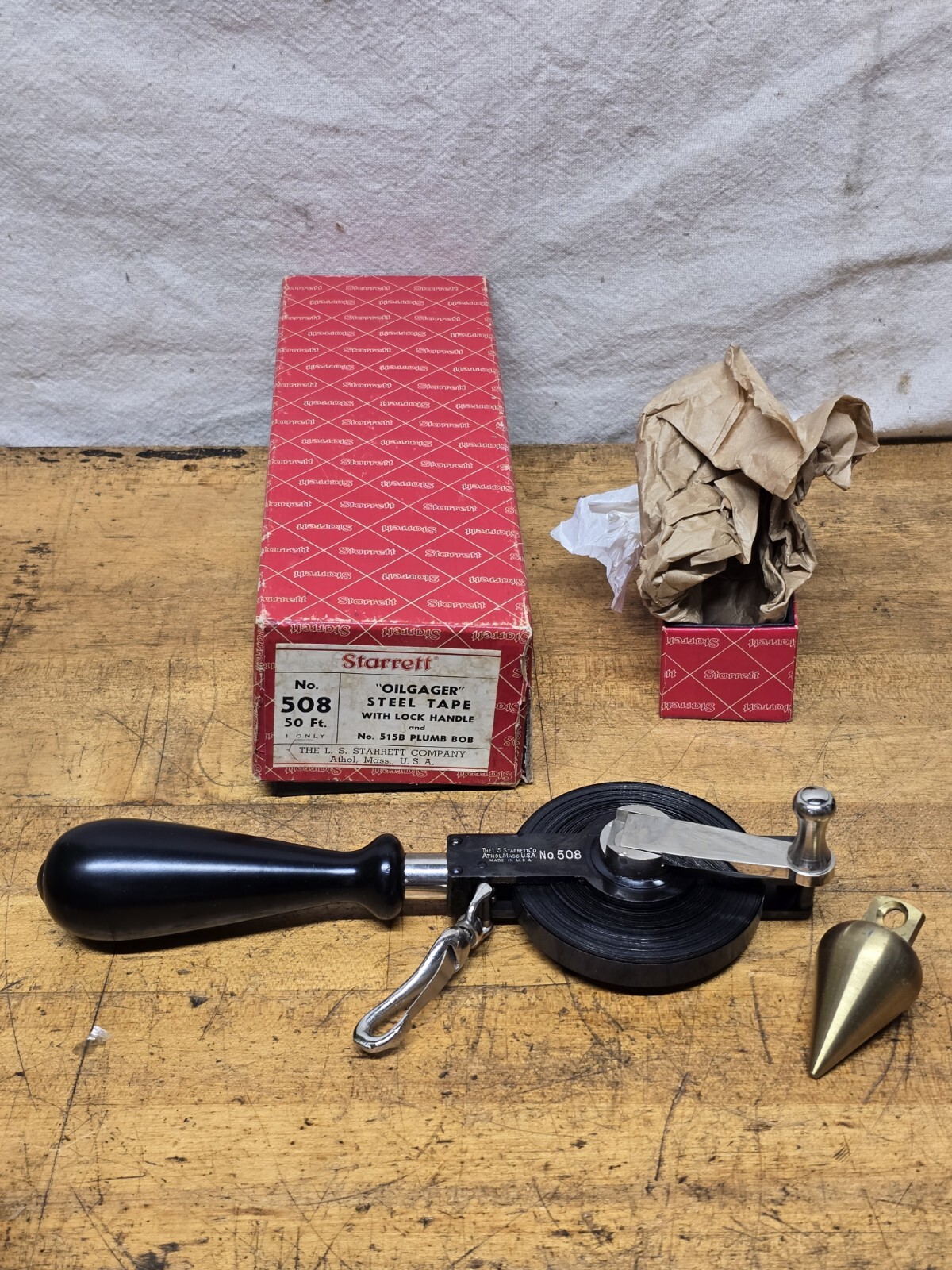 NOS Starrett 508 50 FT OIL-GAGING TAPE, STEEL WITH 515B BRASS PLUMB BOB NEW