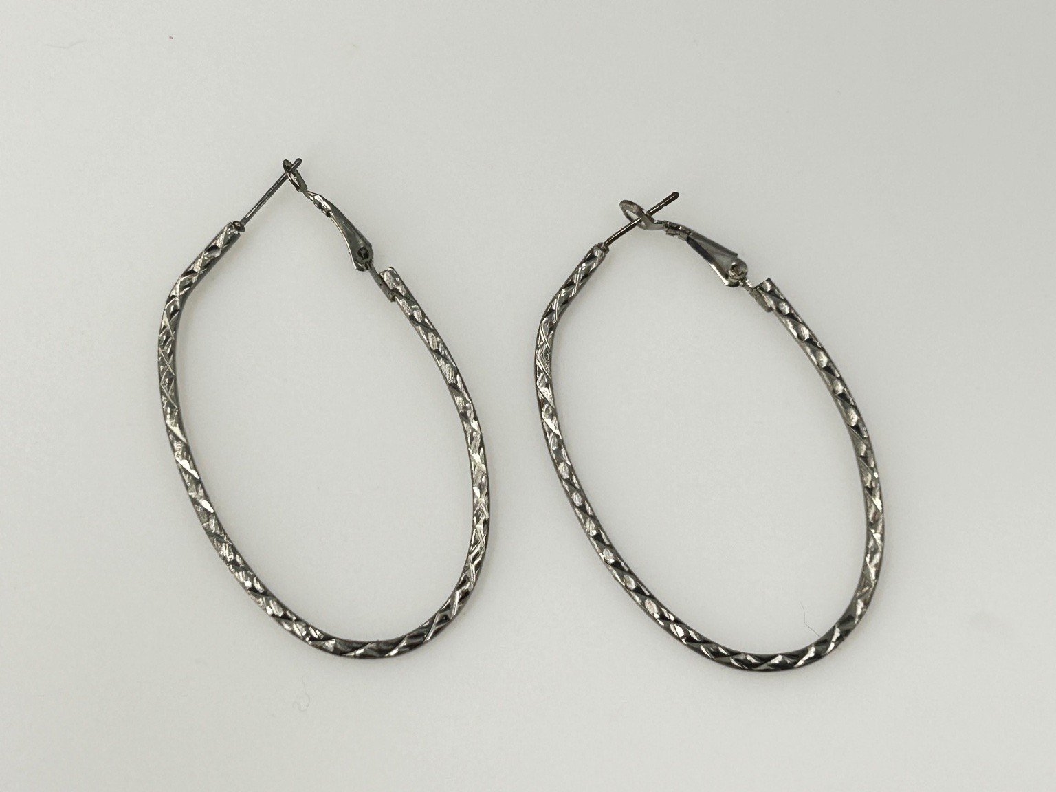 Silver Tone Textured Oval Hoop Earrings Lightweight