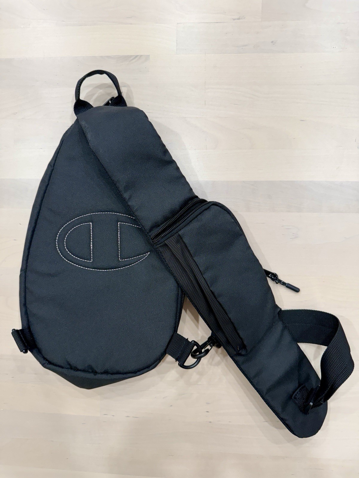Champion Black Small 5L Sling Backpack Adjustable Strap Zipper 2 Pockets