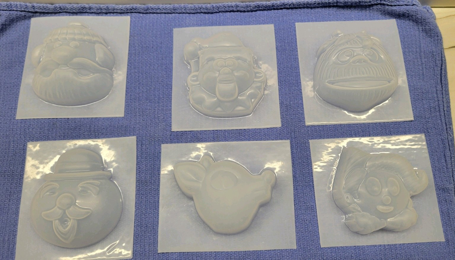 6 PLASTIC VACUUM BATH BOMB MOLDS FROM THE 1964 RUDOLF MOVIE CHARACTERS