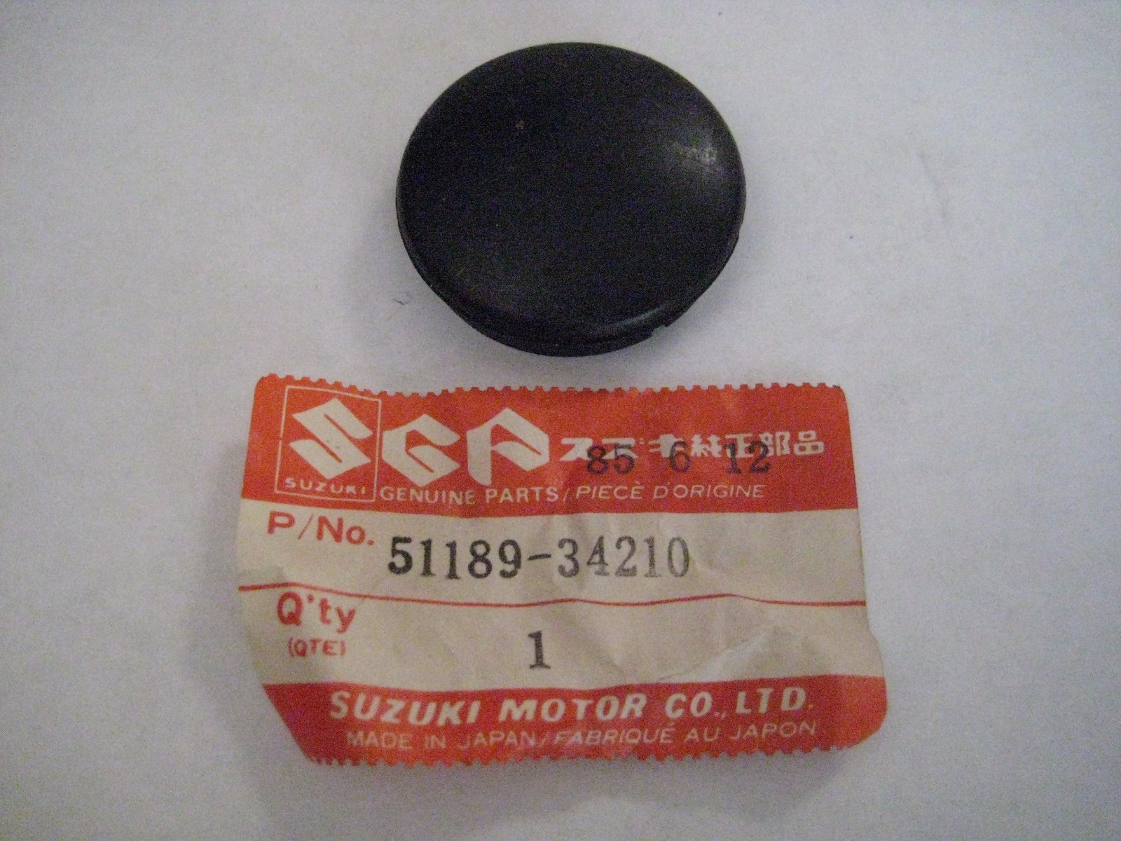 SUZUKI GS700E 1985/ GS650 1983 FRONT FORK CAP NOS!