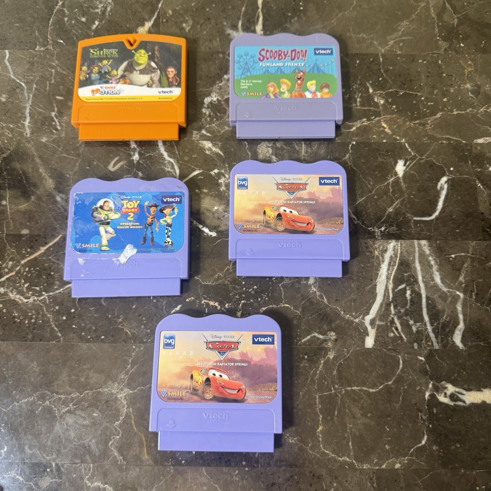 5 VTech V.Smile & V.Smile Motion cart. Cars x2, Toy Story 2, Scooby-Doo, Shrek