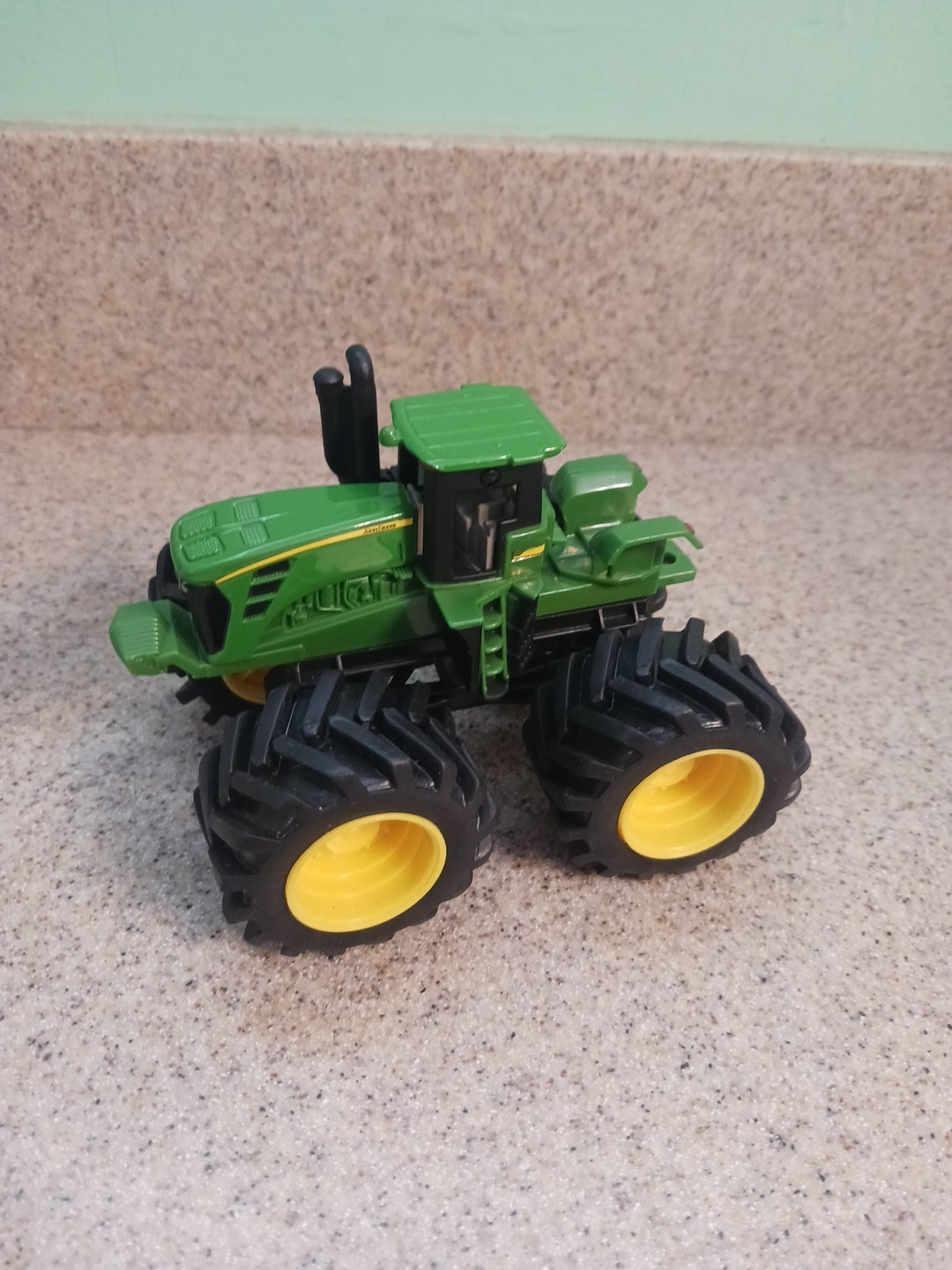Ertl John Deere Plastic Tractor in picture John Deere licensed
