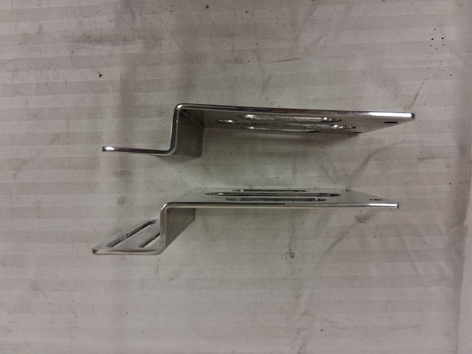 Misc. polished aluminum brackets