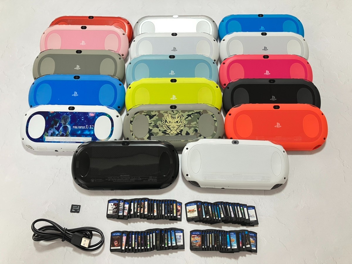 Sony PS Vita PCH-2000 Console with charger / Memory card random 2 games
