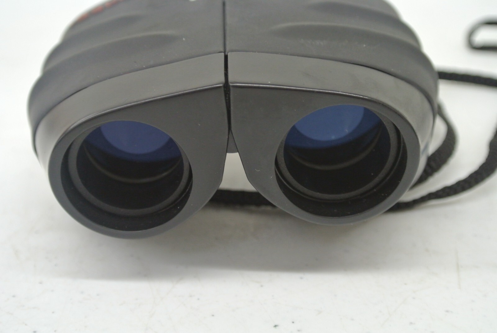 TASCO BINOCULARS 10X25 MM #ES1025 (DNT1212B BY18P)