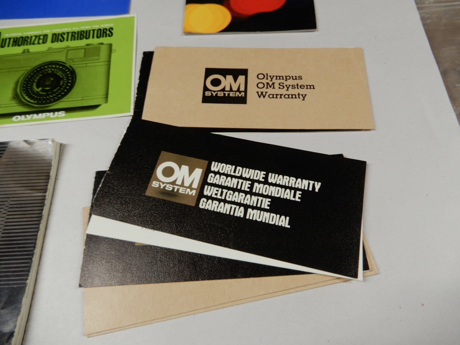 Olymous OM-2 Manual and Many Awesome OM System Sales Brochures