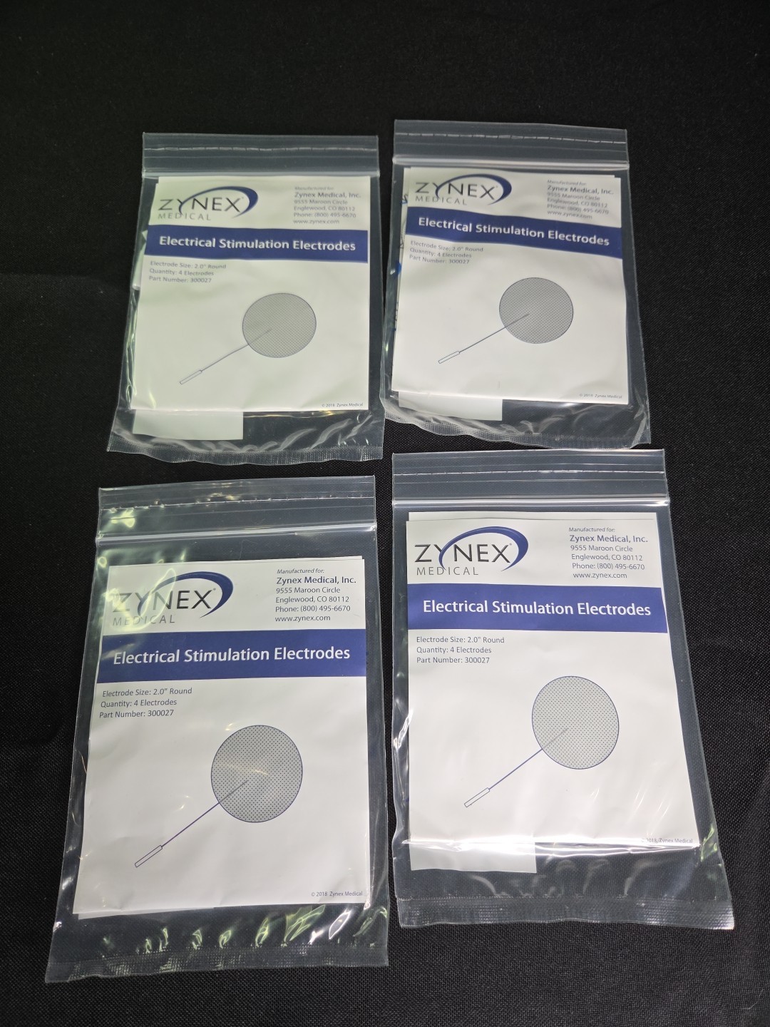 4 NEW Pack of 4 ZYNEX MEDICAL Electrodes 2" Round Pads Reusable #300027