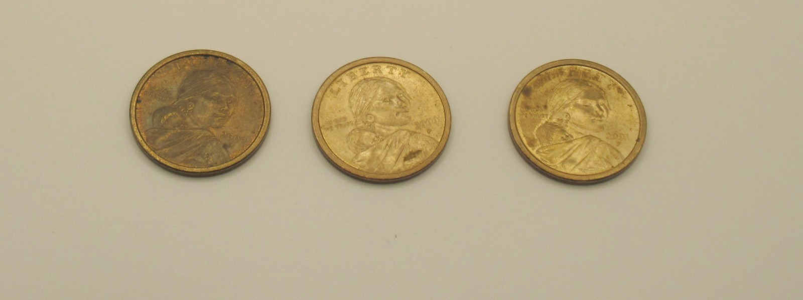 Dollar Coins. 3 Sacajawea Coins