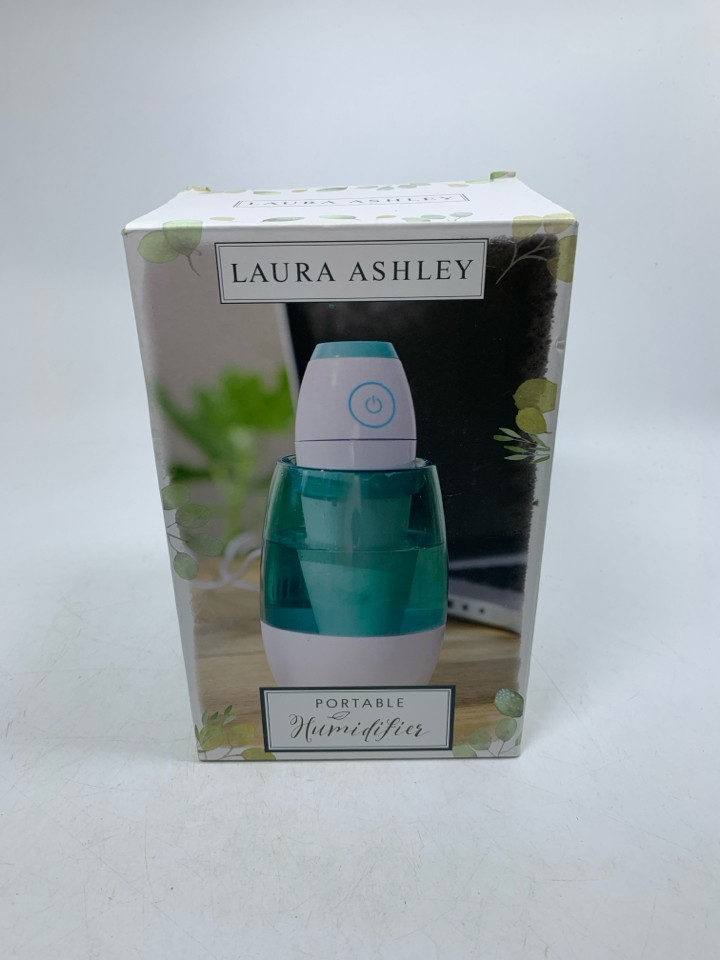 NIB PORTABLE HUMIDIFIER.