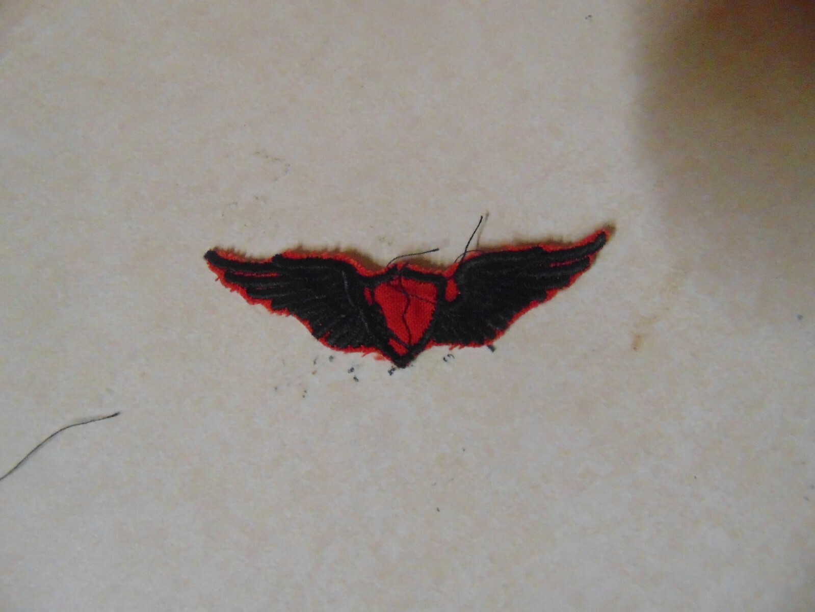PATCH MILITARY SEW ON OLDER GERMAN MADE WINGS OF SOME SORT LOOKS HAND MADE
