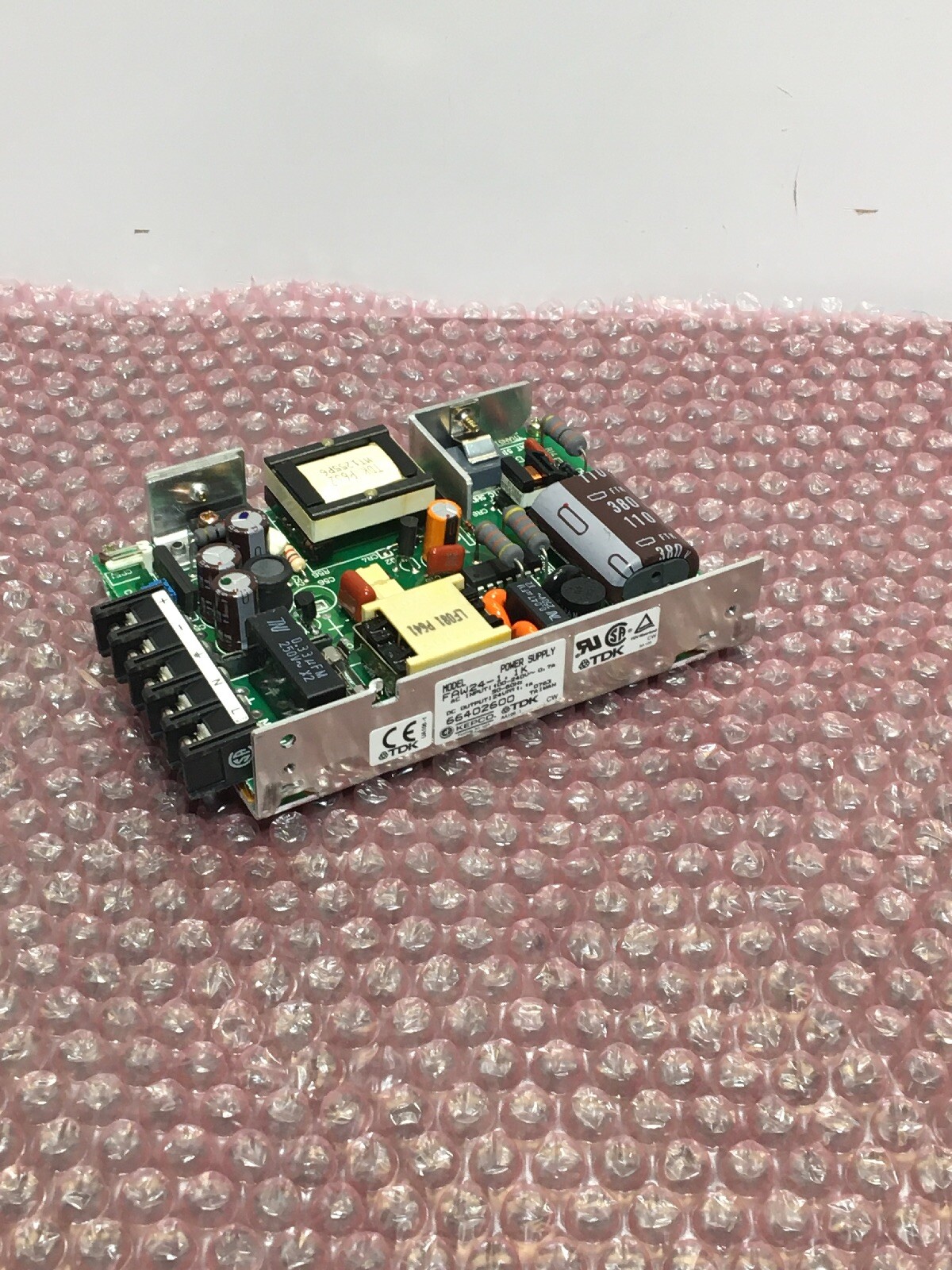 TDK 100-240V 0.7A INPUT 24V 1.1A OUTPUT POWER SUPPLY FAW24-1R1