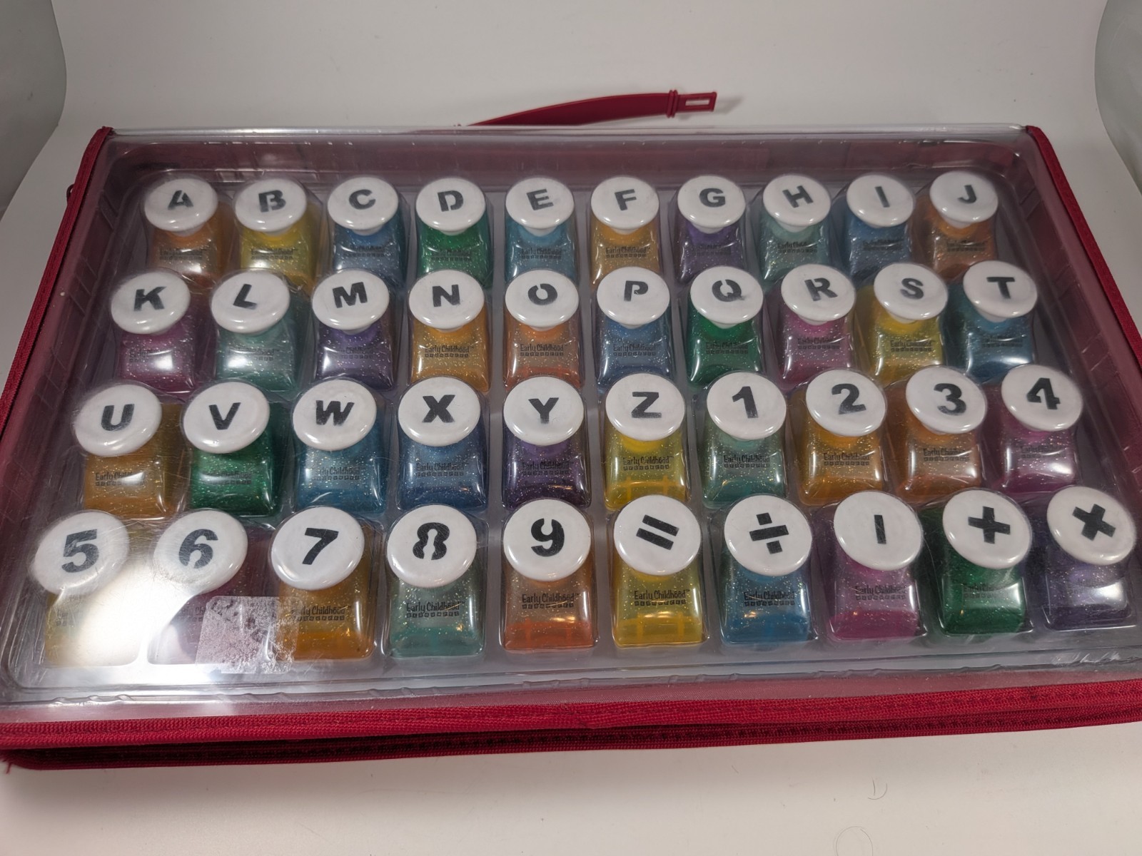Early Childhood Res.  Paper Shaper Punch Alphabet Set A-Z 0-9 Numbers and Signs