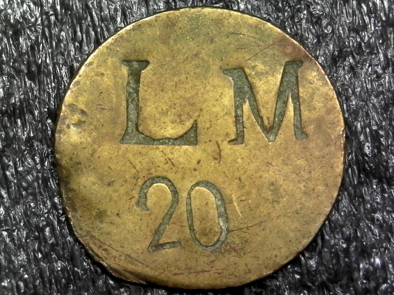 L.M. 20 - Monetary, Commercial, Business Trade Token 24mm (c126)