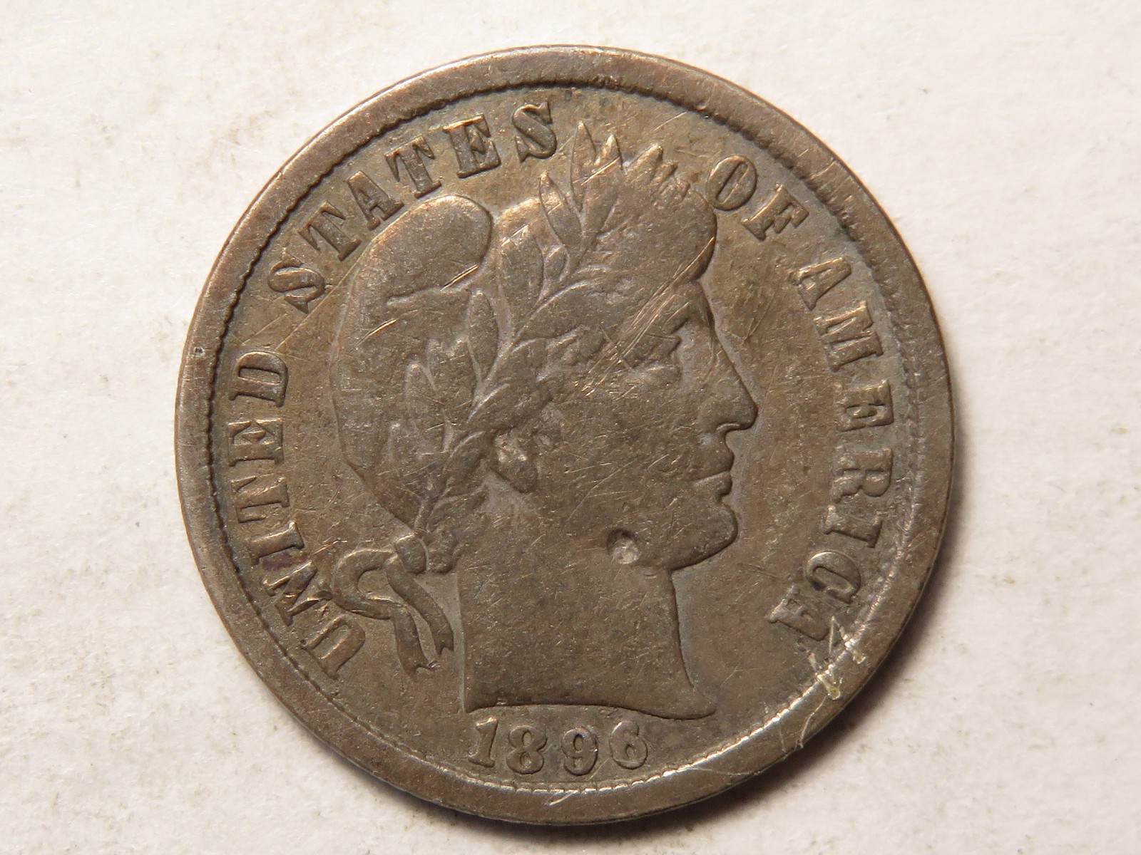1896-O Barber Dime With VF Details; Obverse Ding and Scratches