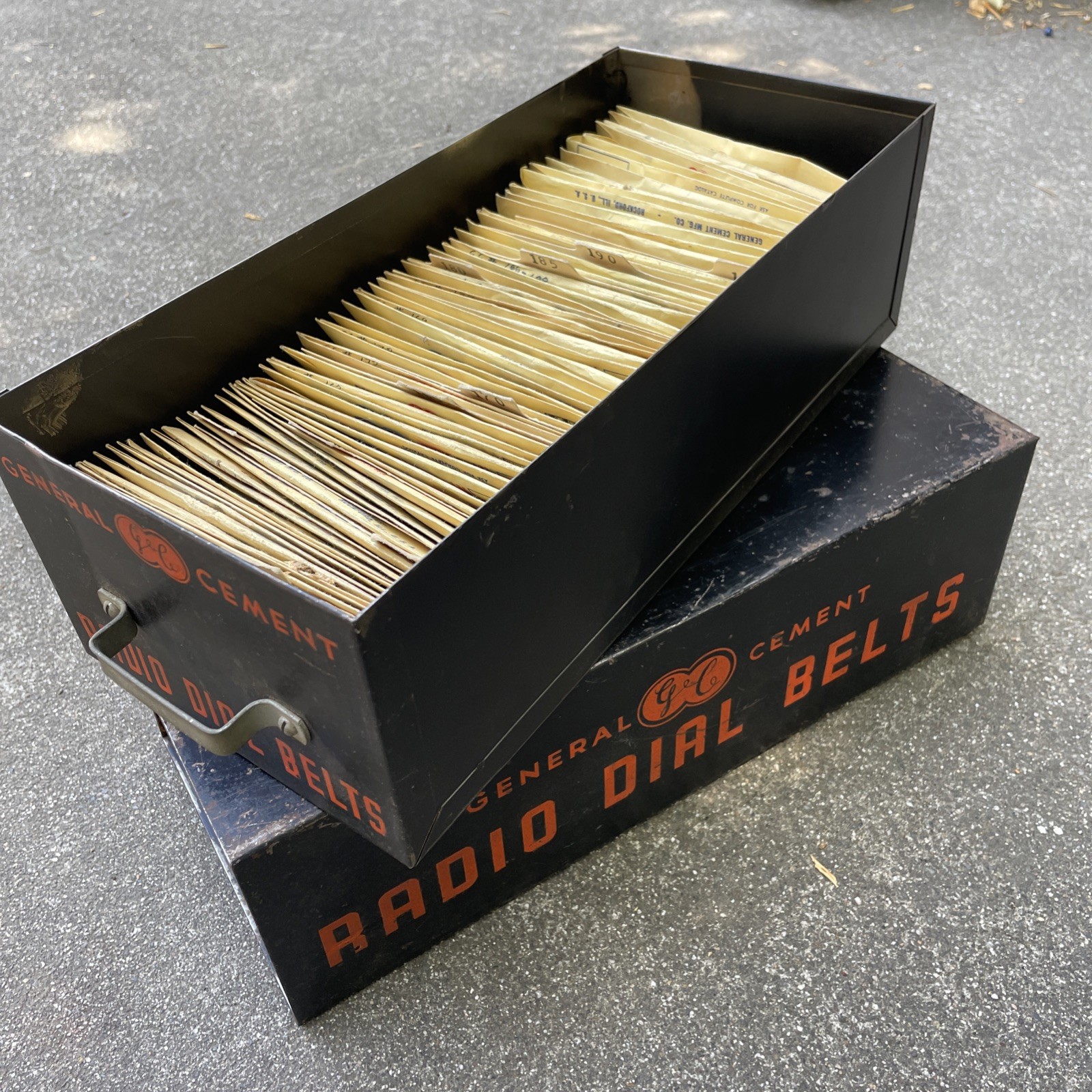 Lot of over 65 JDF & General Cement Radio Dial Belts In Metal GC Cabinet